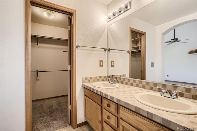 bathroom with vanity and ceiling fan