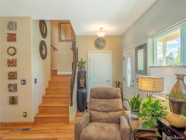 1033 H St, Salida, CO 81201 - foyer featuring light wood-style flooring and stairs