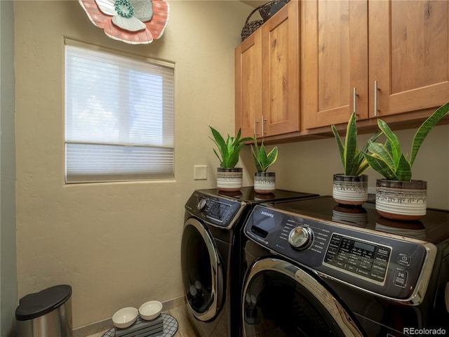 1033 H St, Salida, CO 81201 - washroom featuring cabinet space and separate washer and dryer