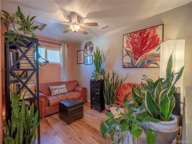 1033 H St, Salida, CO 81201 - living area with wood finished floors and a ceiling fan