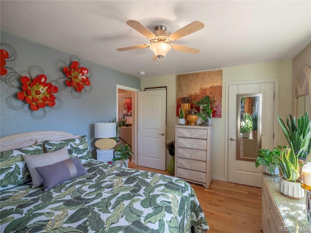 1033 H St, Salida, CO 81201 - bedroom featuring light wood-style flooring and a ceiling fan
