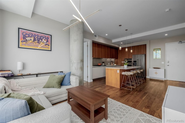 4200 W 17th Ave Unit 625, Denver, CO 80204 - living room with dark wood-type flooring and recessed lighting