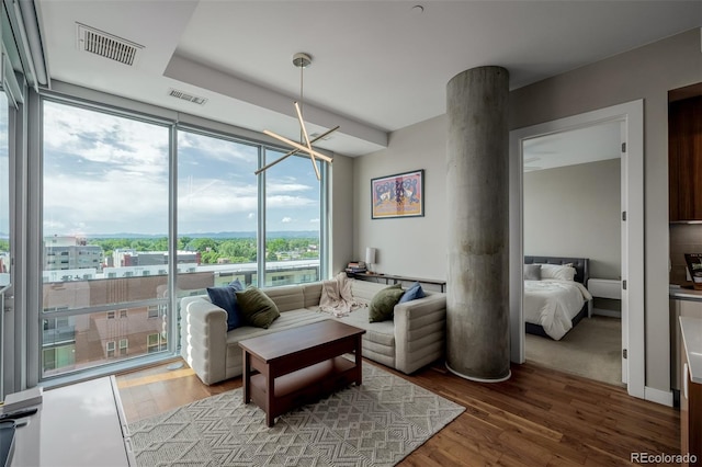 4200 W 17th Ave Unit 625, Denver, CO 80204 - living room with wood finished floors and floor to ceiling windows