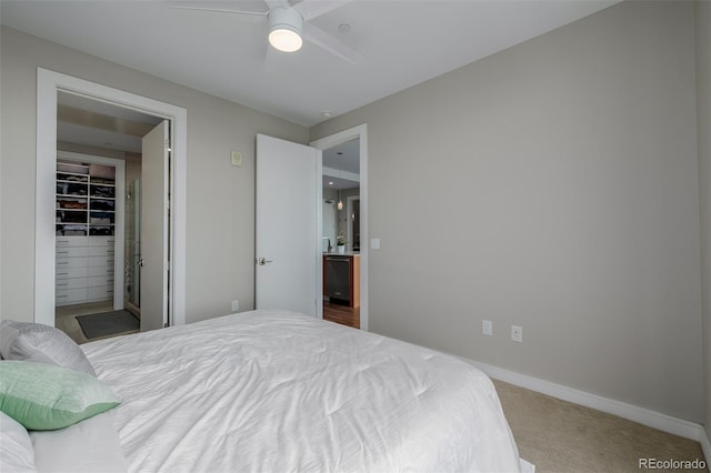 4200 W 17th Ave Unit 625, Denver, CO 80204 - bedroom with a ceiling fan, carpet floors, and a spacious closet