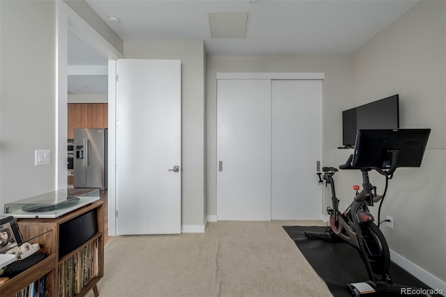 4200 W 17th Ave Unit 625, Denver, CO 80204 - exercise room with carpet and baseboards