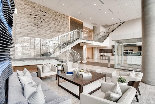 4200 W 17th Ave Unit 625, Denver, CO 80204 - lobby with a high ceiling, stairs, and a paneled ceiling
