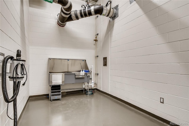 4200 W 17th Ave Unit 625, Denver, CO 80204 - misc room with pet washing area and finished concrete floors