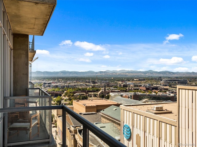 balcony featuring a mountain view