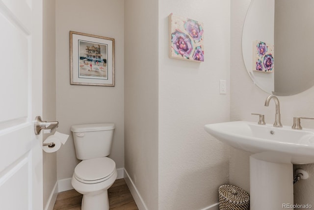 2282 Old Rail Way, Superior, CO 80027 - half bath with toilet and wood finished floors