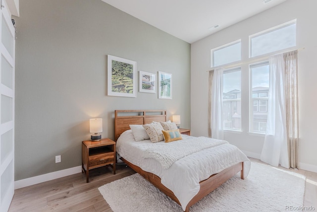 2282 Old Rail Way, Superior, CO 80027 - bedroom with light wood finished floors and baseboards