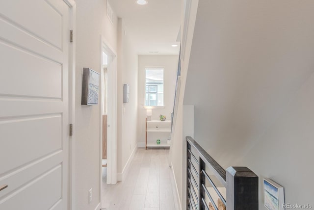 2282 Old Rail Way, Superior, CO 80027 - corridor featuring light wood-type flooring and recessed lighting