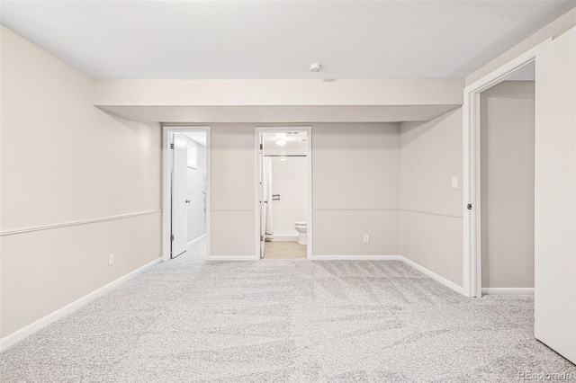 finished basement with carpet and baseboards