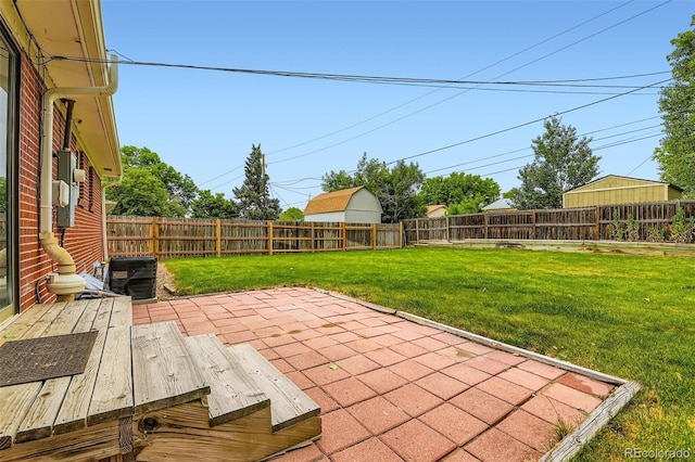 11891 Gaylord Way, Northglenn, CO 80233 - fenced backyard with a patio area
