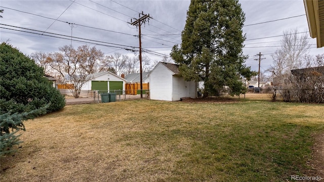 4115 S Clarkson St, Englewood, CO 80113 - view of yard featuring fence and an outbuilding