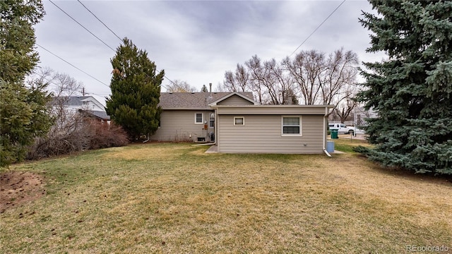 4115 S Clarkson St, Englewood, CO 80113 - back of house featuring a lawn