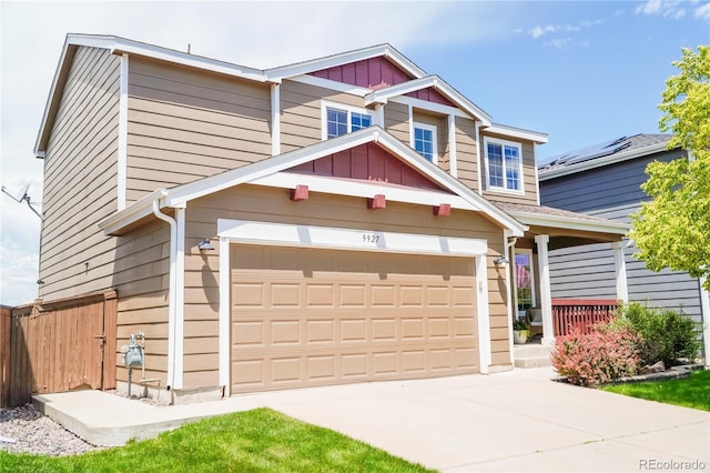 9927 Aftonwood St, Highlands Ranch, CO 80126 - view of front facade with an attached garage, driveway, and board and batten siding