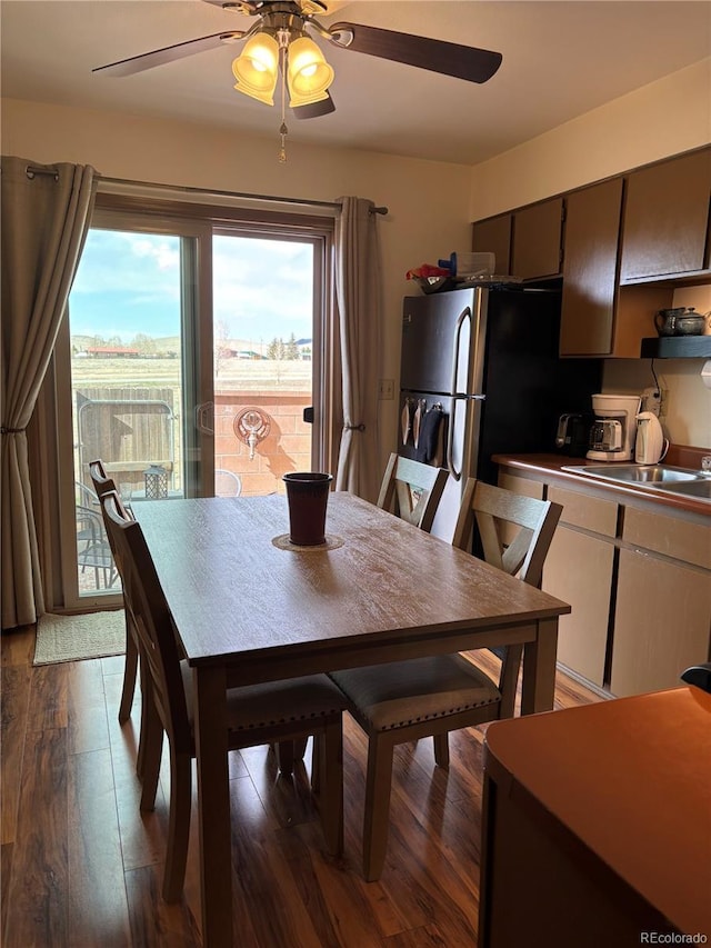 9 Granada Ct Unit 15, Westcliffe, CO 81252 - dining space with a ceiling fan and wood finished floors
