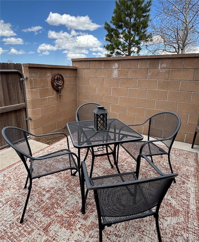 9 Granada Ct Unit 15, Westcliffe, CO 81252 - view of patio / terrace with outdoor dining area and fence