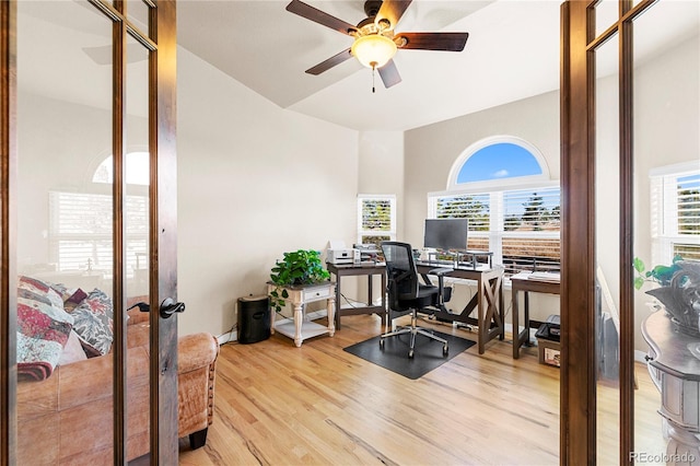 office space featuring french doors, hardwood / wood-style flooring, and ceiling fan