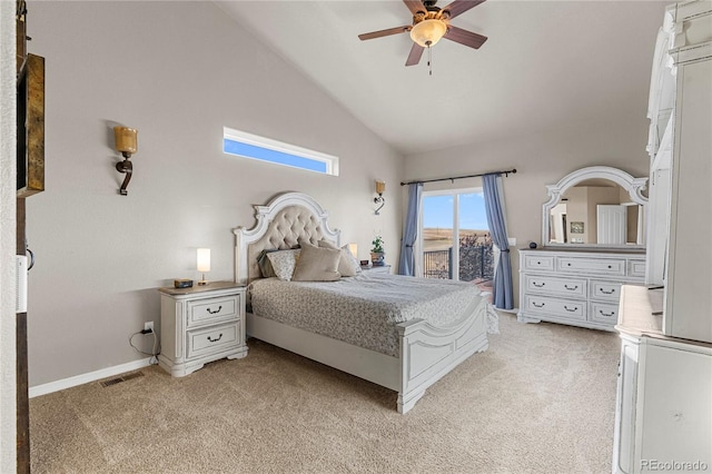 carpeted bedroom featuring high vaulted ceiling and ceiling fan