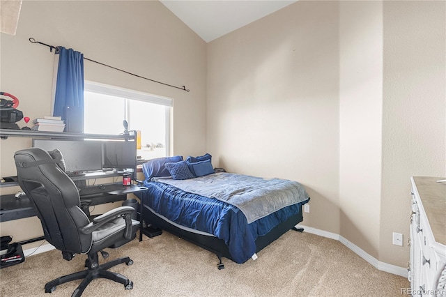 carpeted bedroom featuring vaulted ceiling