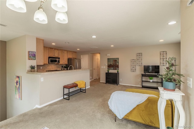 9760 Mayfair St Unit A, Englewood, CO 80112 - living room featuring light colored carpet and recessed lighting