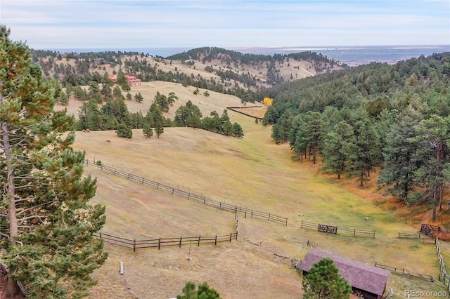 view of mountain feature with a rural view