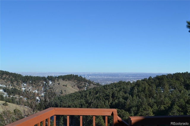 view of mountain feature with a view of trees