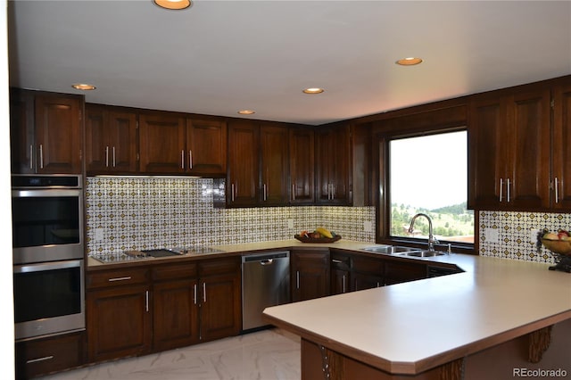21849 Cabrini Blvd, Golden, CO 80401 - kitchen with appliances with stainless steel finishes, recessed lighting, a peninsula, light countertops, and tasteful backsplash