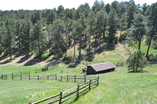 21849 Cabrini Blvd, Golden, CO 80401 - view of yard with a view of countryside, an outbuilding, and a view of trees