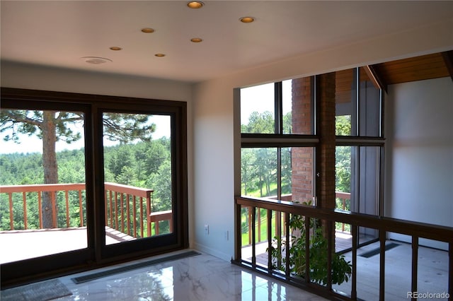 21849 Cabrini Blvd, Golden, CO 80401 - doorway with recessed lighting and marble finish flooring