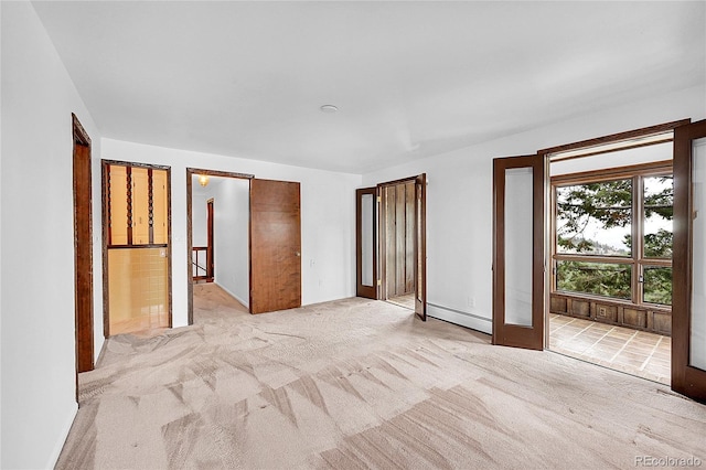 21849 Cabrini Blvd, Golden, CO 80401 - spare room featuring baseboard heating and light colored carpet