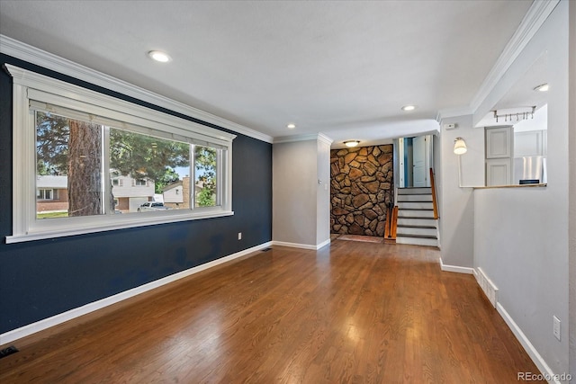 9350 Raleigh Ct, Westminster, CO 80031 - unfurnished room with crown molding, stairway, wood finished floors, and recessed lighting