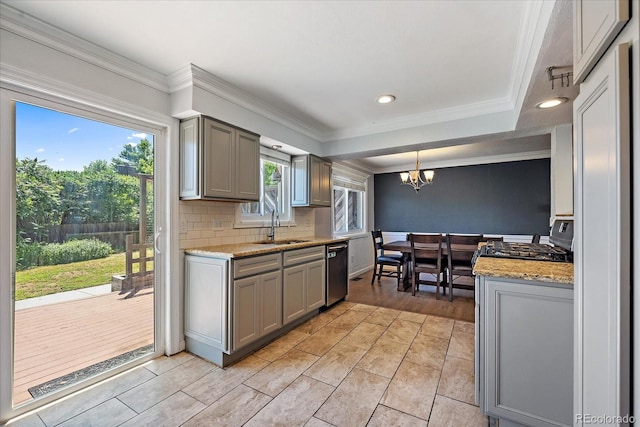 9350 Raleigh Ct, Westminster, CO 80031 - kitchen with gray cabinetry, backsplash, a chandelier, stainless steel dishwasher, and light stone countertops