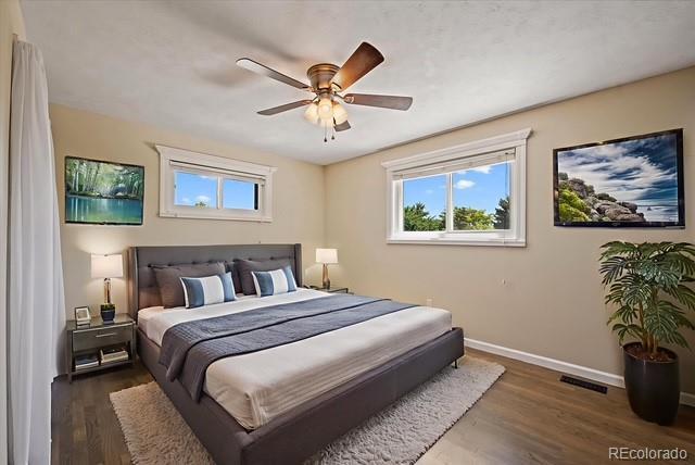 9350 Raleigh Ct, Westminster, CO 80031 - bedroom featuring wood finished floors and ceiling fan
