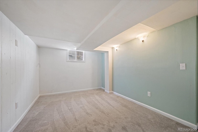 9350 Raleigh Ct, Westminster, CO 80031 - carpeted empty room with baseboards and wood walls
