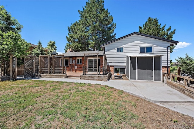 9350 Raleigh Ct, Westminster, CO 80031 - back of house featuring a patio area and brick siding