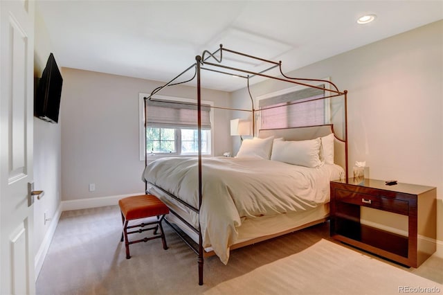 bedroom featuring recessed lighting and baseboards