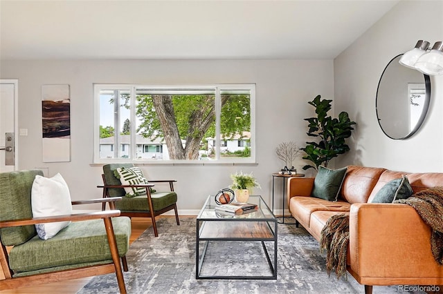 5436 E Atlantic Pl, Denver, CO 80222 - living area featuring wood finished floors and baseboards
