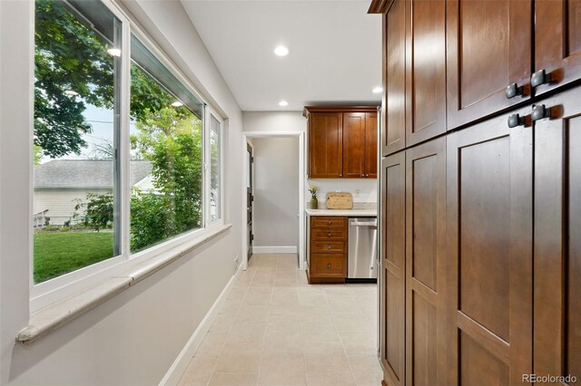 5436 E Atlantic Pl, Denver, CO 80222 - kitchen featuring dishwasher, baseboards, recessed lighting, light countertops, and light tile patterned floors