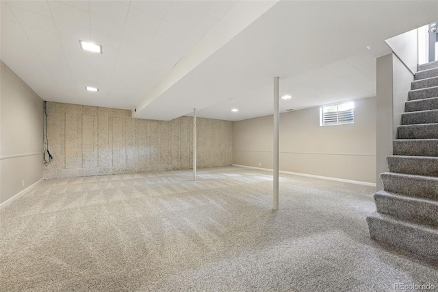 5436 E Atlantic Pl, Denver, CO 80222 - below grade area featuring stairs, carpet flooring, and baseboards