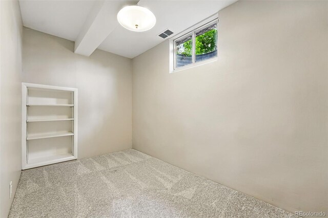 5436 E Atlantic Pl, Denver, CO 80222 - spare room with carpet flooring and beamed ceiling