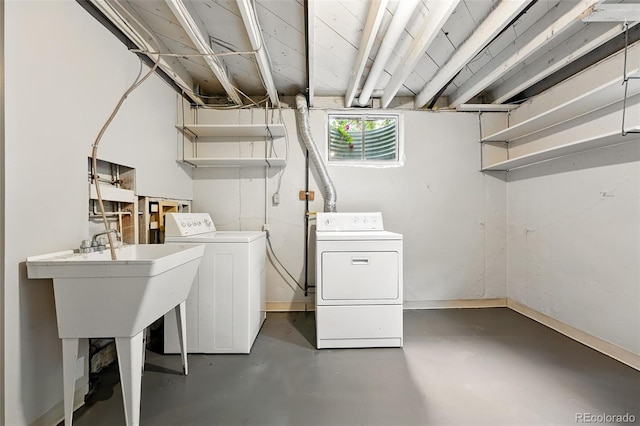 5436 E Atlantic Pl, Denver, CO 80222 - washroom with washing machine and clothes dryer