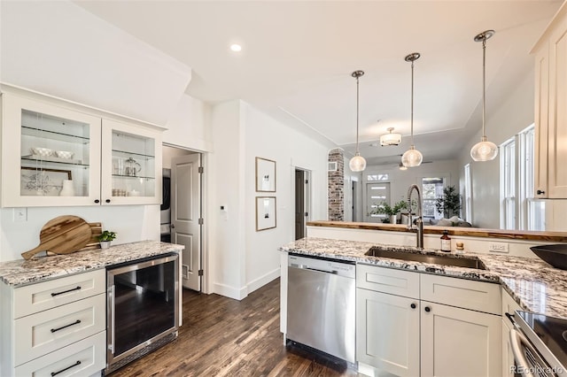 3521 Osage St, Denver, CO 80211 - kitchen featuring beverage cooler, appliances with stainless steel finishes, a sink, dark wood-style floors, and glass insert cabinets