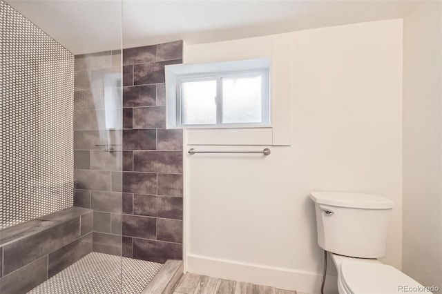 3521 Osage St, Denver, CO 80211 - bathroom with toilet, walk in shower, and wood finished floors