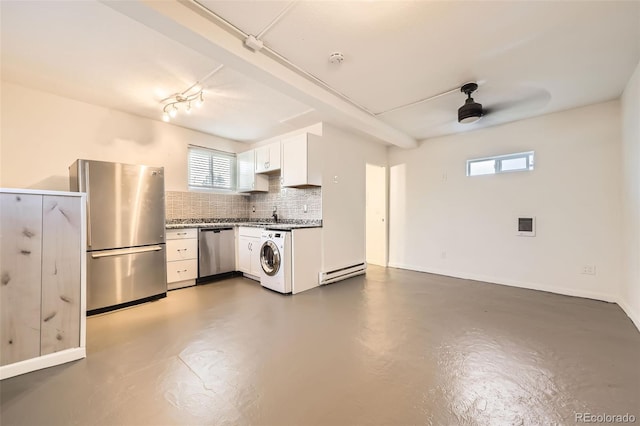 3521 Osage St, Denver, CO 80211 - kitchen featuring appliances with stainless steel finishes, washer / dryer, a baseboard heating unit, finished concrete flooring, and tasteful backsplash