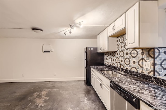 3521 Osage St, Denver, CO 80211 - kitchen featuring stainless steel dishwasher, unfinished concrete floors, freestanding refrigerator, white cabinetry, and tasteful backsplash