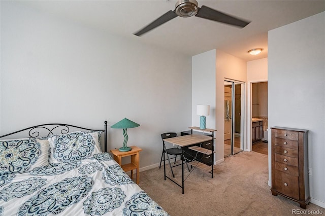 13456 Via Varra Unit 225, Broomfield, CO 80020 - carpeted bedroom featuring connected bathroom, a closet, and a ceiling fan