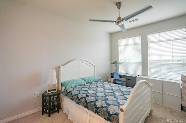 13456 Via Varra Unit 225, Broomfield, CO 80020 - bedroom featuring light colored carpet and ceiling fan
