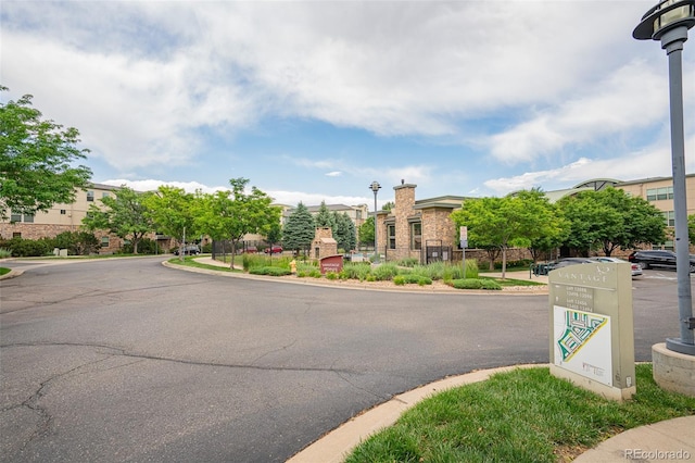 13456 Via Varra Unit 225, Broomfield, CO 80020 - view of asphalt street featuring street lights and curbs